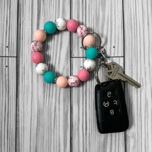 Butterfly/Flower silicone, wristlet with silver embellishments